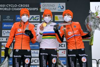 OOSTENDE BELGIUM JANUARY 30 Podium Annemarie Worst of The Netherlands Silver medal Lucinda Brand of The Netherlands World Champion Jersey Gold medal and Denise Betsema of The Netherlands Bronze medal Celebration Rainbow Jersey Mask Covid safety measures during the 72nd UCI CycloCross World Championships Oostende 2021 Women Elite a 146km UCICX CXWorldCup Ostend2021 CX on January 30 2021 in Oostende Belgium Photo by Luc ClaessenGetty Images