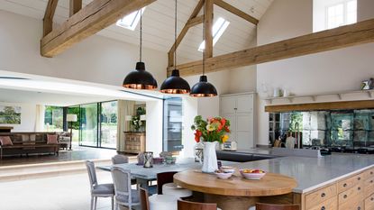 kitchen with island and beams
