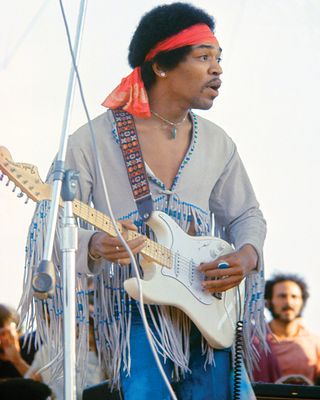Hendrix performing at Woodstock in 1969