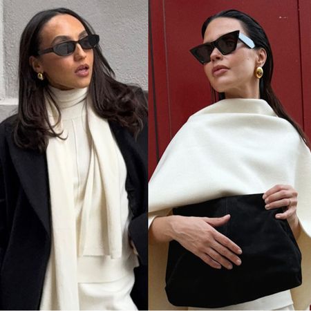 Ivory pant winter outfit ideas are shown in a collage of street style photos from women. On the left, a woman is standing outside wearing a black coat over a white sweater with an attached scarf styled with matching white pants, black sunglasses, gold earrings, black ankle boots, and a black bag. On the right, a woman is standing outside wearing black sunglasses, gold earrings, a white cape styled with a white sweater, white trousers, black pointed heels, and a black suede clutch bag. 
