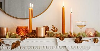 White living room mantle piece with autumn decor ideas with scented candles