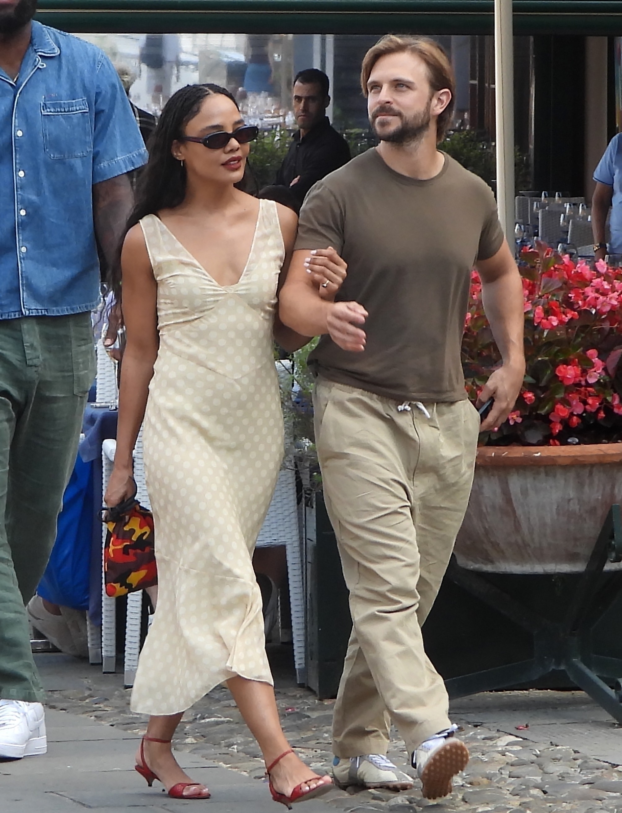 American actress Tessa Thompson and her boyfriend, Brandon Green, are seen holding hands as they enjoy a romantic stroll through the picturesque cobbled streets of Portofino, Italy.
