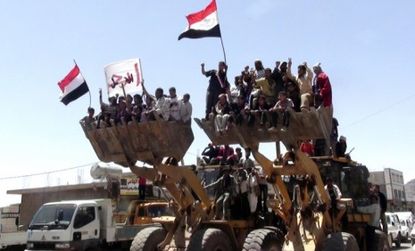 Young Yemeni protesters demand that President Ali Abdullah Saleh be brought to justice for his alleged corruption, instead of being granted immunity