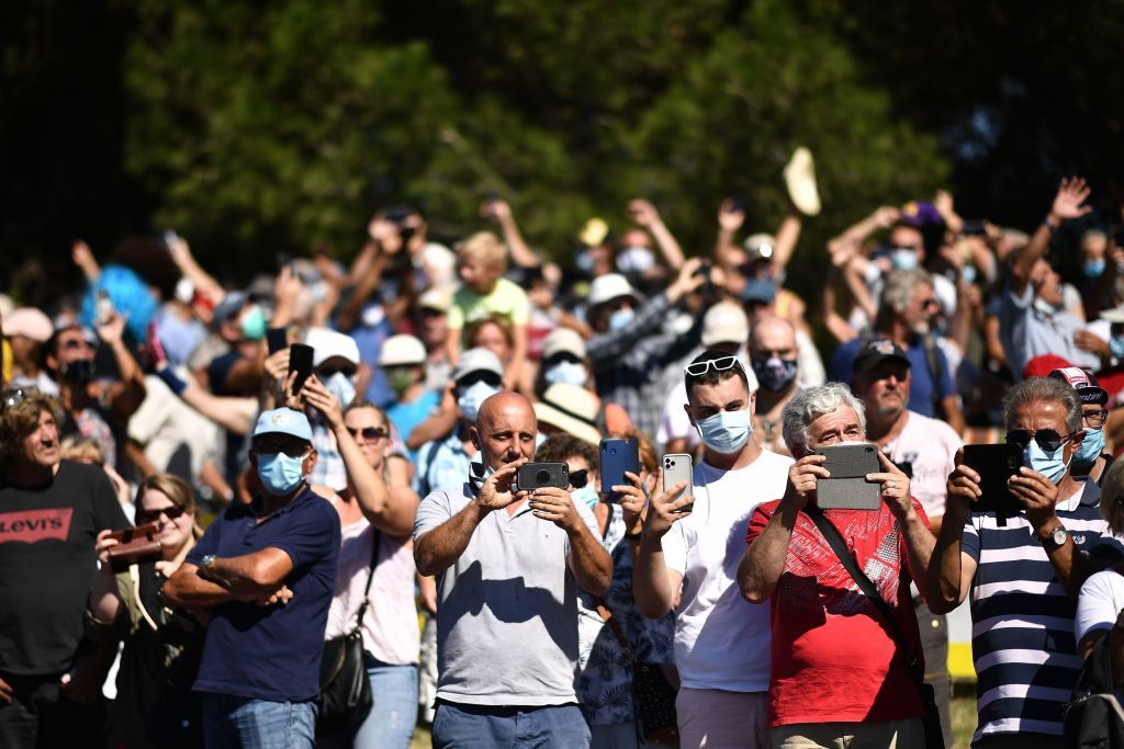 Spectators wait for the riders during the 10th stage of the 107th edition of the Tour de France cycling race 170 km between Le Chateau dOleron and Saint Martin de Re on September 8 2020 Photo by AnneChristine POUJOULAT AFP Photo by ANNECHRISTINE POUJOULATAFP via Getty Images