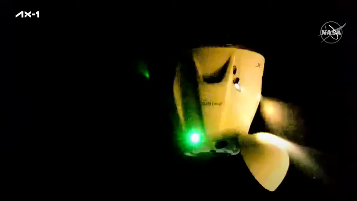 SpaceX's Crew Dragon Endeavour carrying the private Ax-1 astronaut crew fires its thrusters to depart the International Space Station after a successful undocking on April 24, 2022.