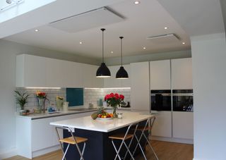 infrared heating panels on the ceiling in a kitchen