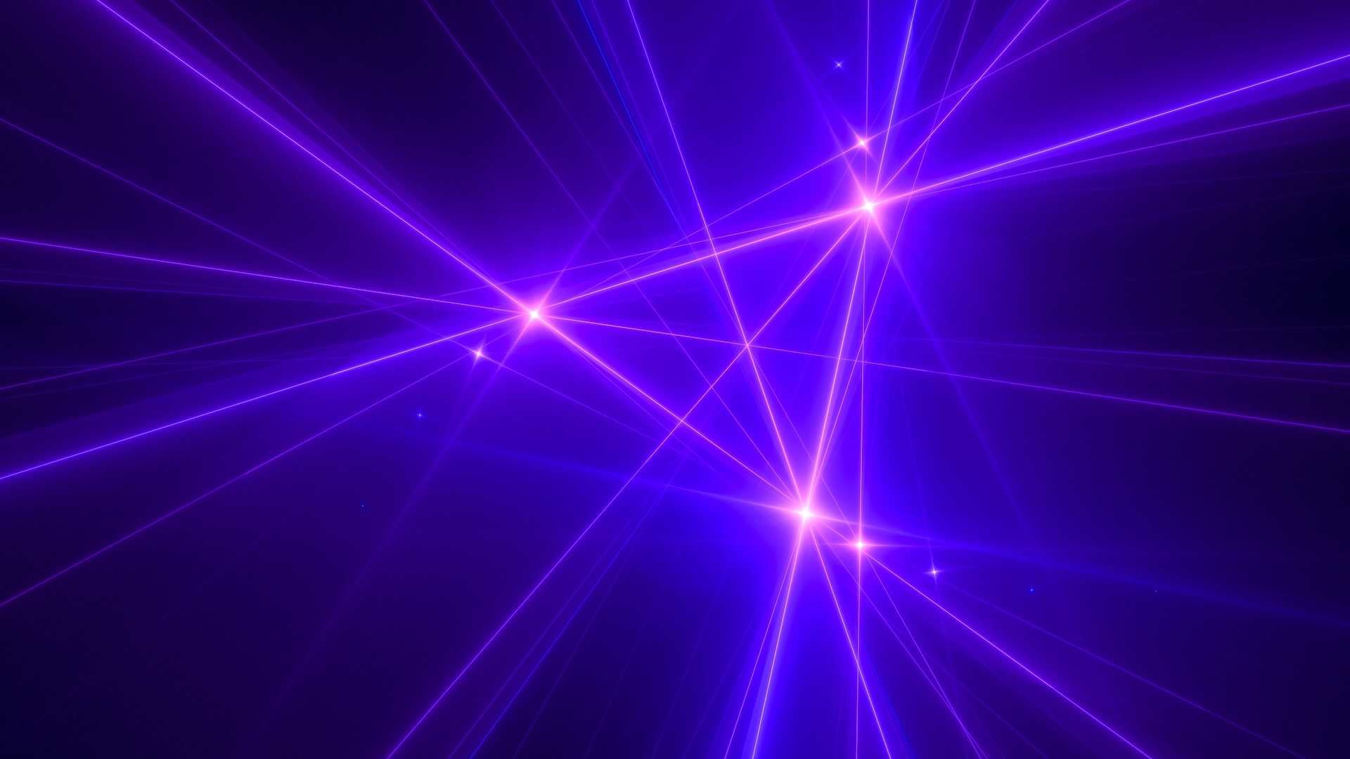 an abstract image of intersecting lasers