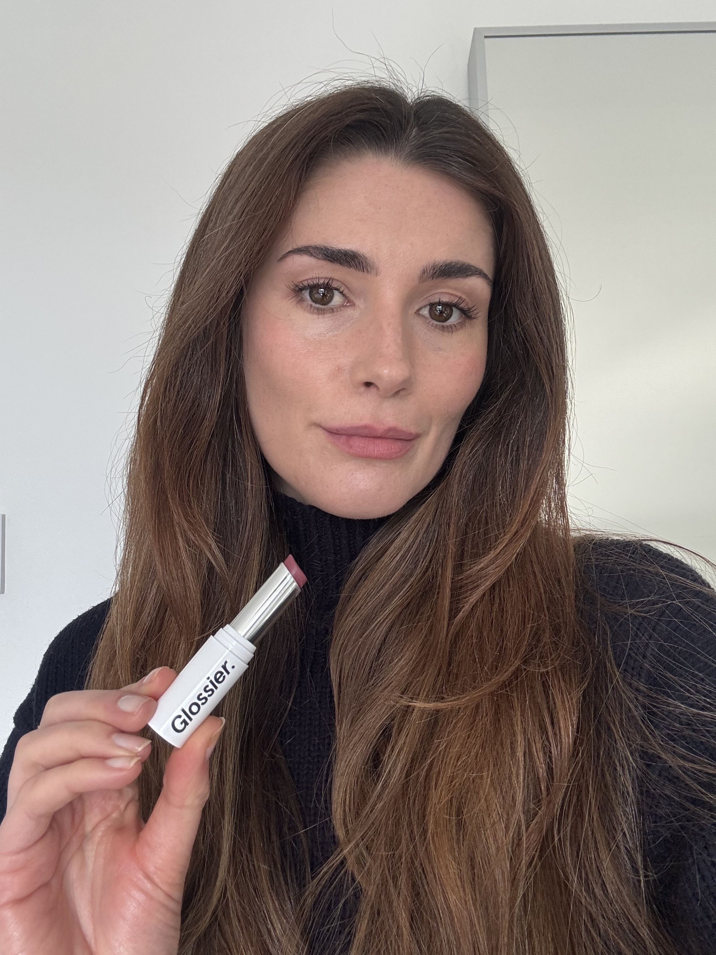 Eleanor wearing Glossier Generation G lipstick in Like