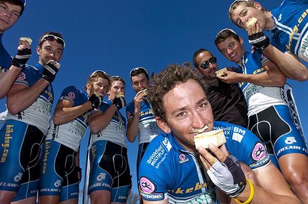 The team from Bikebug.com enjoy some vanilla slices in Ouyen prior to the start of stage 11.