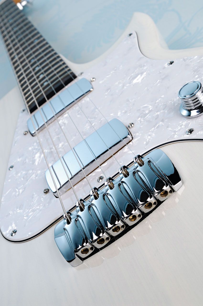 The Classic's chrome hardware and pearloid scratchplate