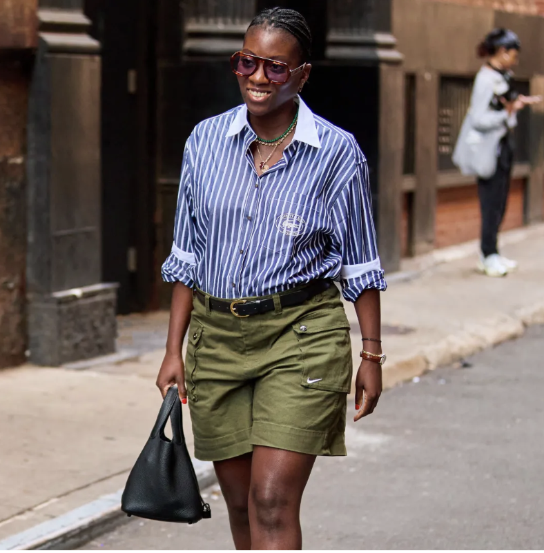 nikki ogunnaike wearing a button-down shirt and shorts