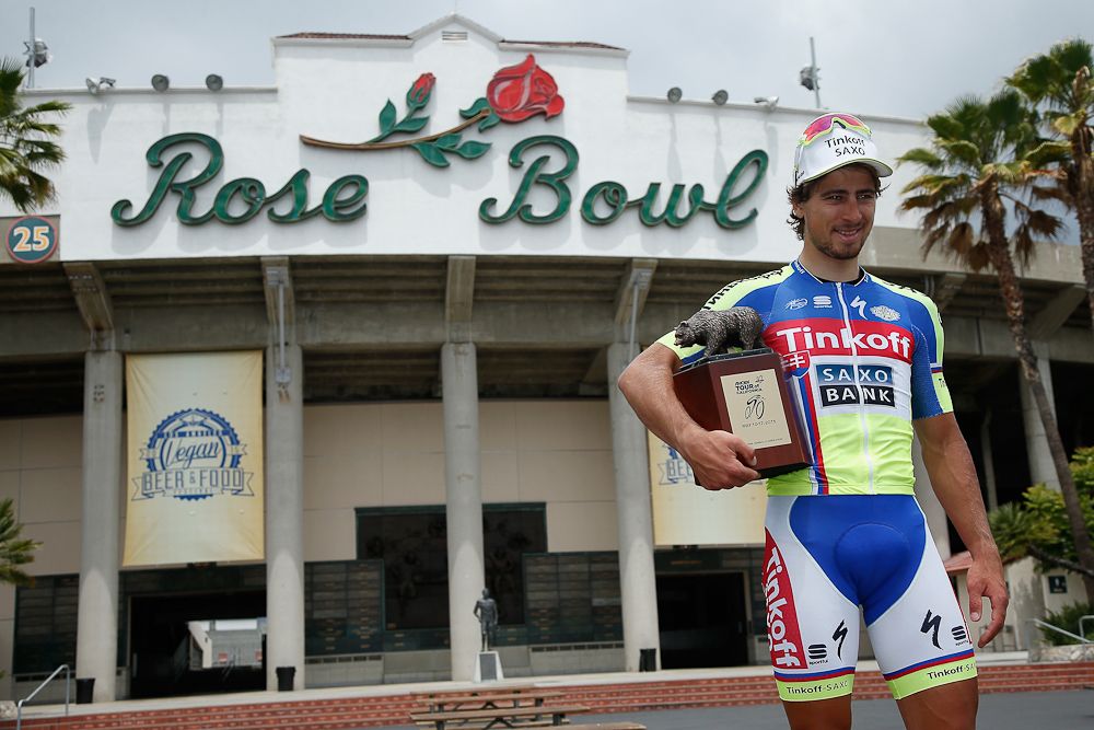 Peter Sagan poses for a picture with his 2015 Tour of California trophy in front of the Rose Bowl
