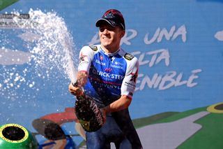 ALTO DEL PIORNAL SPAIN SEPTEMBER 08 Remco Evenepoel of Belgium and Team QuickStep Alpha Vinyl celebrates winning the stage on the podium ceremony after the 77th Tour of Spain 2022 Stage 18 a 192km stage from Trujillo to Alto del Piornal 1163m LaVuelta22 WorldTour on September 08 2022 in Alto del Piornal Caceres Spain Photo by Justin SetterfieldGetty Images