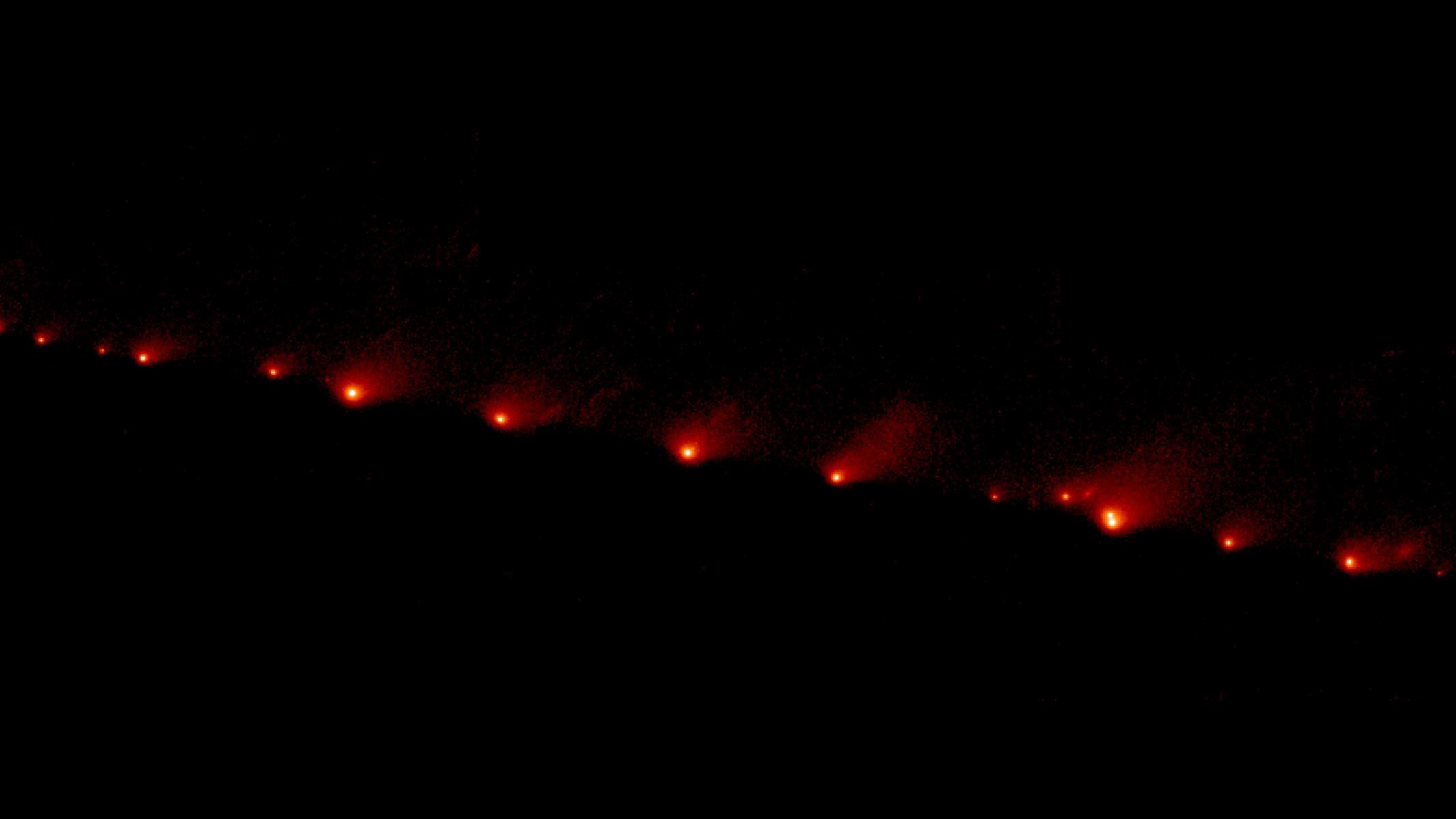 Scattered fragments of comet Shoemaker-Levy 9 captured on May 17, 1994 by the Hubble Space Telescope