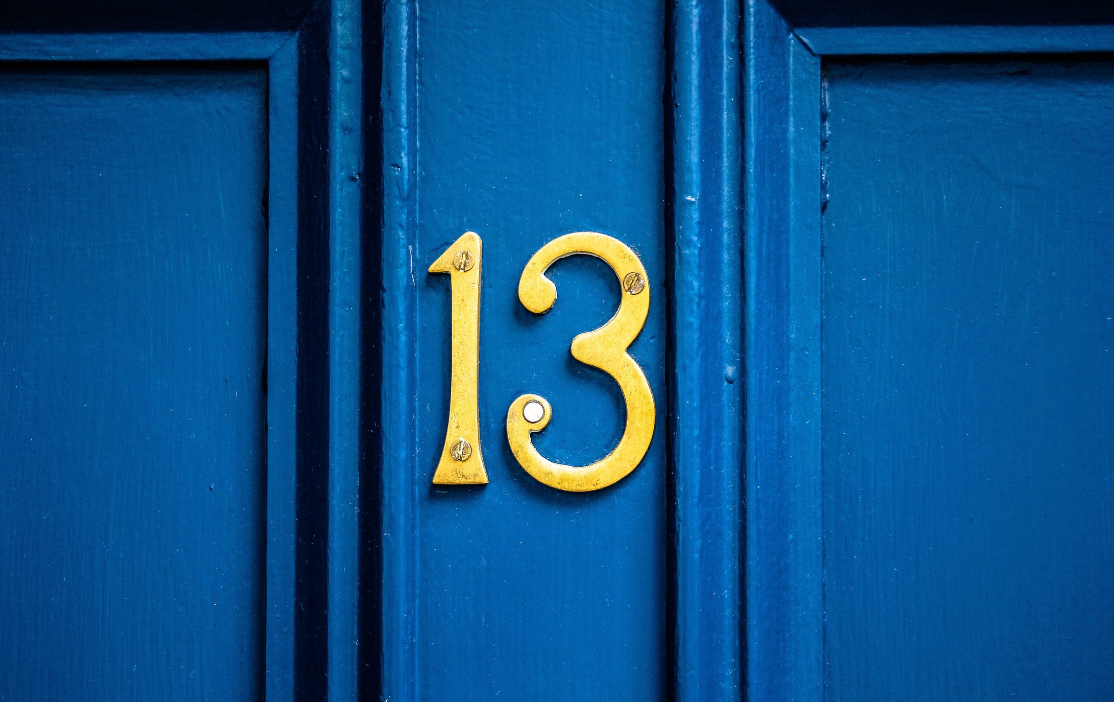 Number 13 on a blue front door