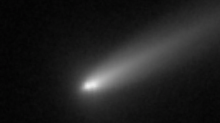 Looped animation of a comet breaking into three distinct pieces that move apart in space