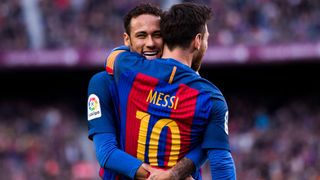 Lionel Messi and Neymar celebrate a goal at Barcelona.