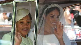 topshot meghan markle r and her mother, doria ragland, arrive for her wedding ceremony to marry britains prince harry, duke of sussex, at st georges chapel, windsor castle, in windsor, on may 19, 2018 photo by oli scarff afp photo credit should read oli scarffafp via getty images