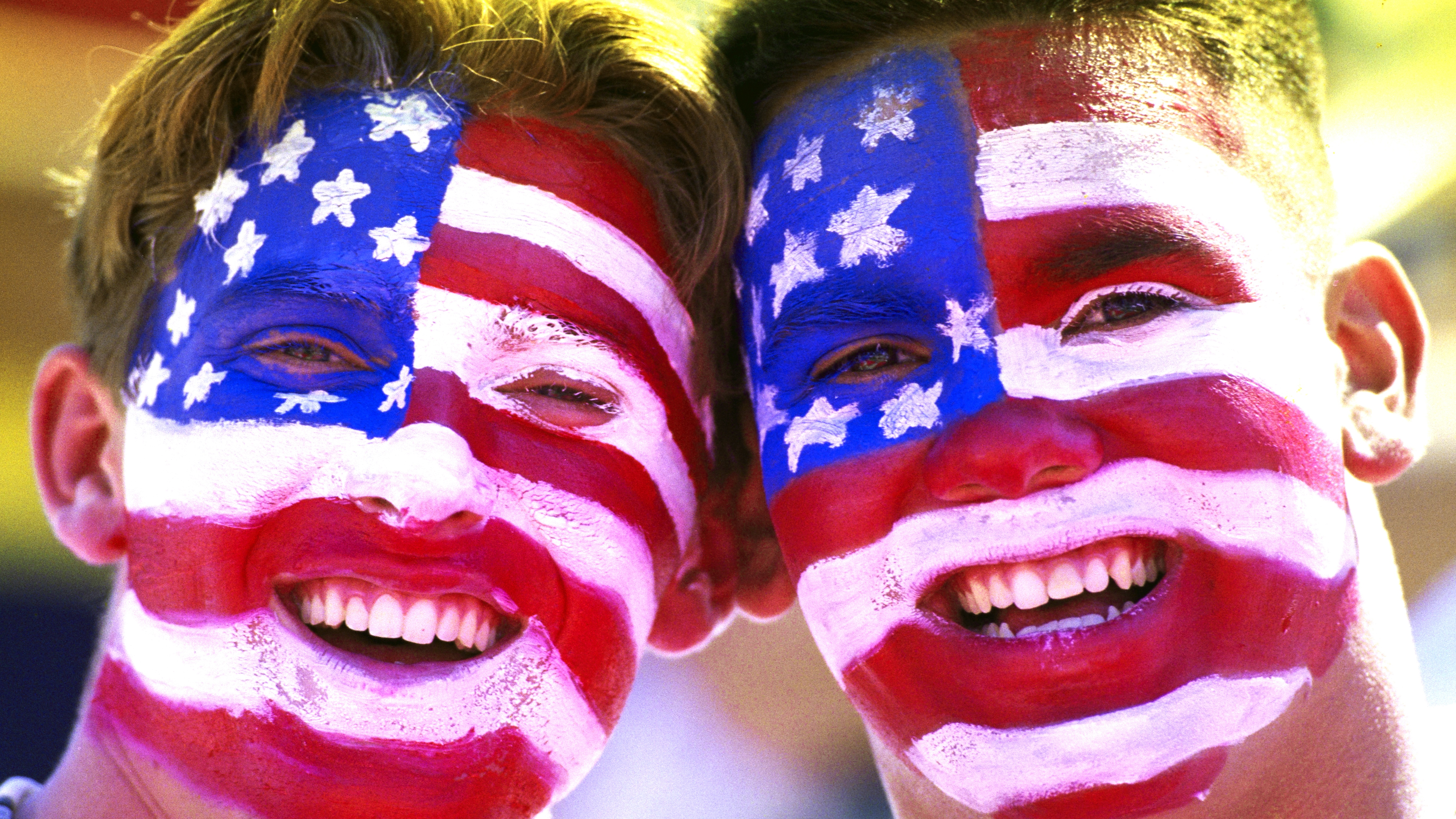 United States of America football team supporters wears Stars and Stripes face paint during the 1994 FIFA World Cup group A game between the United States and Colombia on 22nd June 1994 at the Rose Bowl, Pasadena, California, United States. USA won the match 2 - 1. (Photo by David Cannon/Allsport/Getty Images)