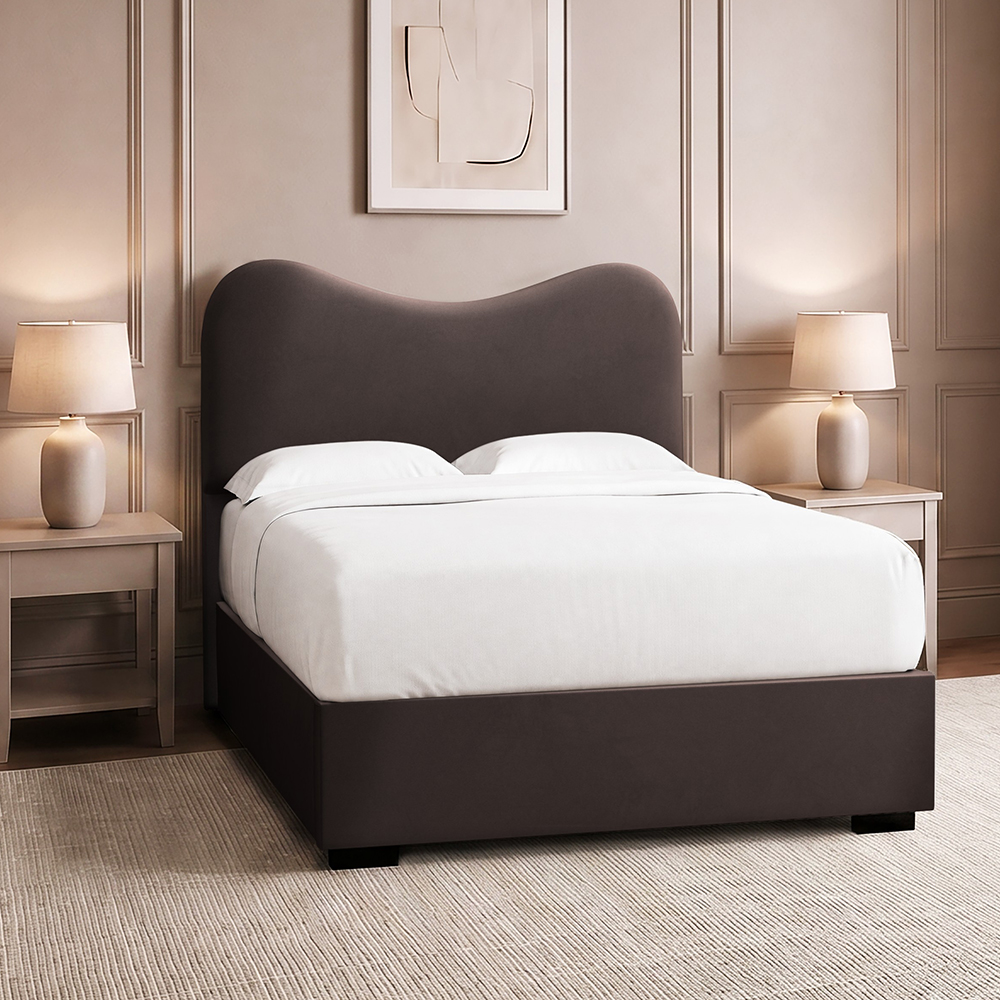 Chocolate brown velvet upholstered bed in a neutral bedroom