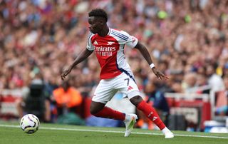 Arsenal squad for 2024/25 LONDON, ENGLAND - AUGUST 31: Bukayo Saka of Arsenal controls the ball during the Premier League match between Arsenal FC and Brighton & Hove Albion FC at Emirates Stadium on August 31, 2024 in London, England. (Photo by Ryan Pierse/Getty Images)