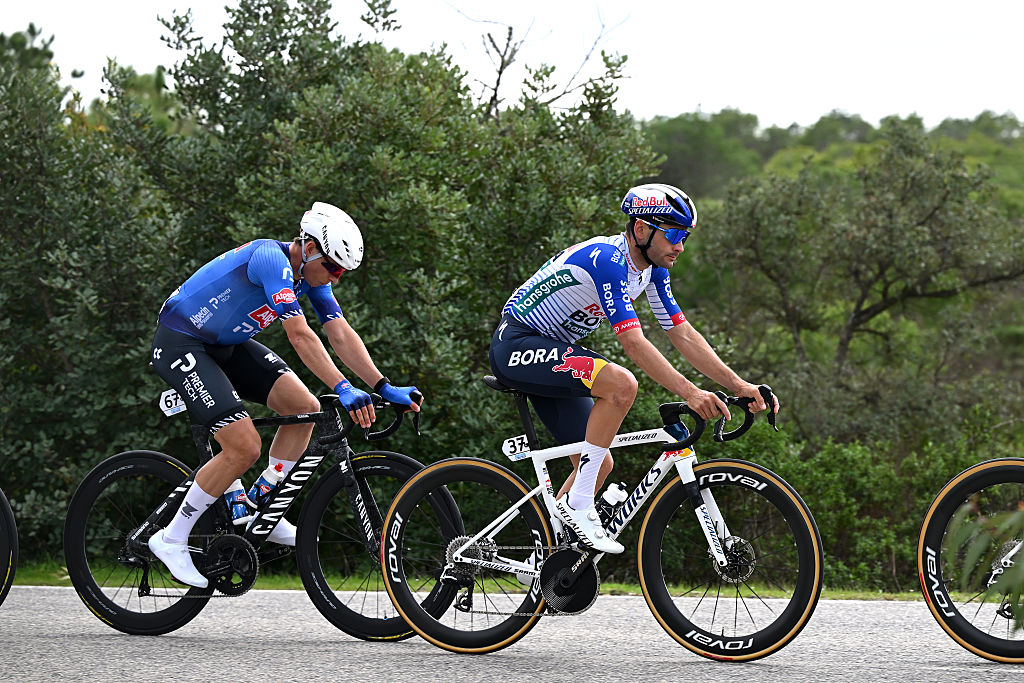 TAVIRA, PORTUGAL - FEBRUARY 18: (L-R) Jasper Philipsen of Belgium and Team Alpecin-Premier Tech and Gianni Vermeersch of Belgium and Team Red Bull - BORA - hansgrohe compete during the 52nd Volta ao Algarve em Bicicleta 2026 - Stage 1 a 183.5km stage from Vila Real de Santo Antonio to Tavira on February 18, 2026 in Tavira, Portugal. (Photo by Dario Belingheri/Getty Images)