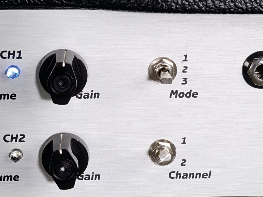 The brushed-metal front panel gives the amp an industrial vibe
