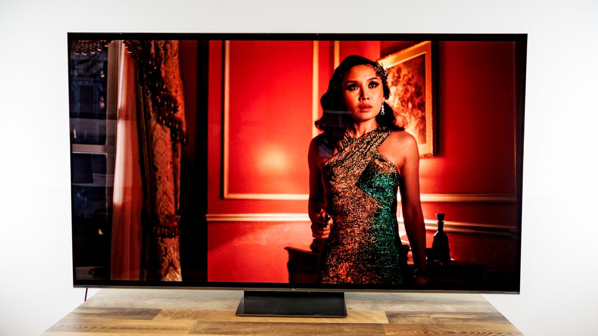 TCL QM7L 75-inch TV on a desk