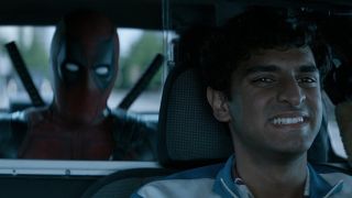 Ryan Reynolds' Deadpool and Karan Soni's Dopinder in a taxi