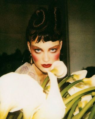 image from Stéphane Marais' Beauty Flash book showing model in heavy blush and eyeshadow looking into camera