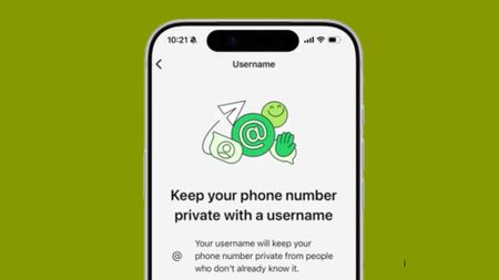 A phone on a green background showing the WhatsApp username setup process