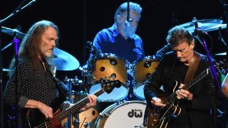 Timothy B. Schmit, Don Henley and Steuart Smith of the Eagles perform during SiriusXM presents the Eagles in their first ever concert at the Grand Ole Opry House on October 29, 2017 in Nashville, Tennessee.