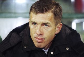 Slovenia coach Srečko Katanec looks on during a World Cup qualifier against Romania in November 2001.