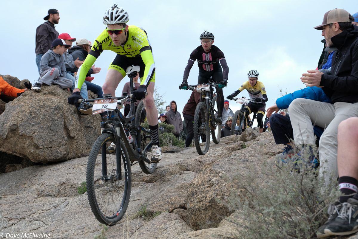 Riders descending slickrock