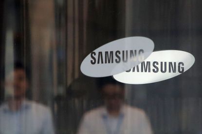 The Samsung logo on a window.