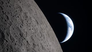 A view of Earth from the moon, with half the Earth illuminated and the gray surface of the moon in the foreground.
