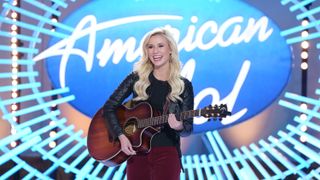 American Idol contestant Emily Faith with guitar