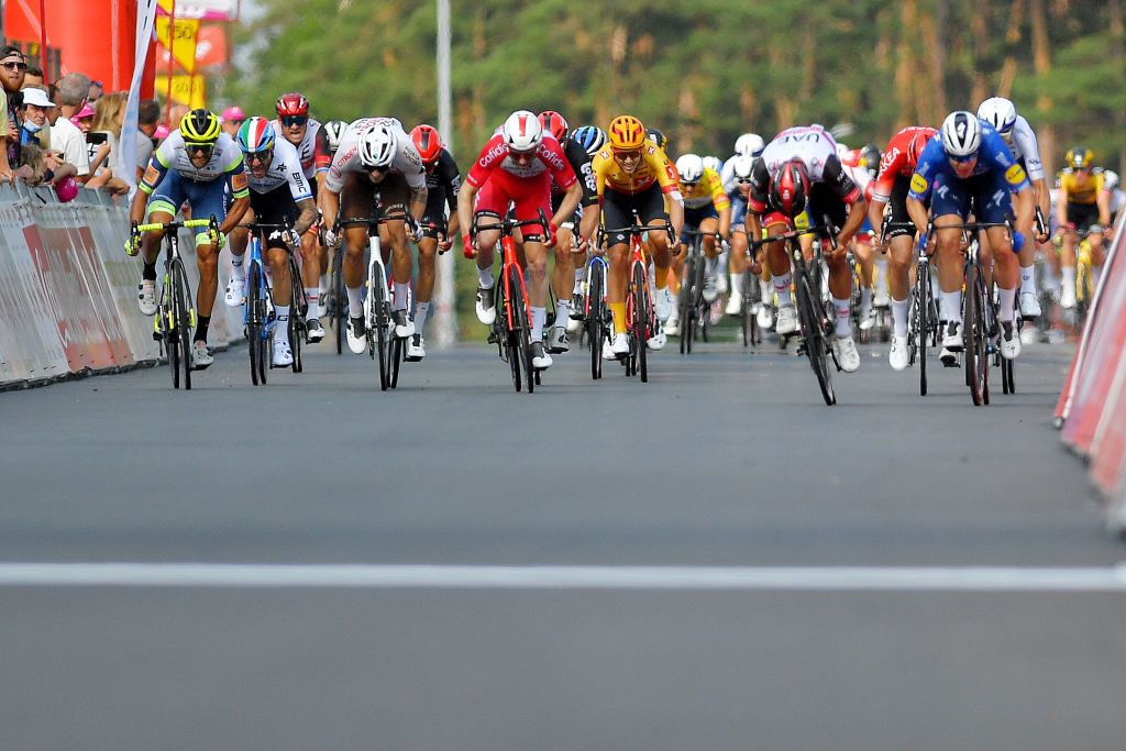 HEUSDENZOLDER BELGIUM JULY 21 Giacomo Nizzolo of Italy and Team Qhubeka Nexthash Andrea Pasqualon of Italy and Team Intermarch Wanty Gobert Matriaux Marc Sarreau of France and AG2R Citren Team Fernando Gaviria Rendon of Colombia and UAE Team Emirates Fabio Jakobsen of Netherlands and Team Deceuninck QuickStep Amaury Capiot of Belgium and Team Arka Samsic sprint at arrival during the 42nd Tour de Wallonie 2021 Stage 2 a 120km stage from Zolder Circuit to Zolder Circuit Race held at the Zolder Circuit due to flooding in the country tourdewallonie grandprixdewallonie on July 21 2021 in HeusdenZolder Belgium Photo by Luc ClaessenGetty Images