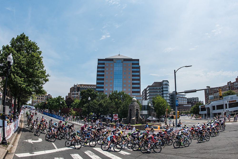 The peloton takes a tight turn one.