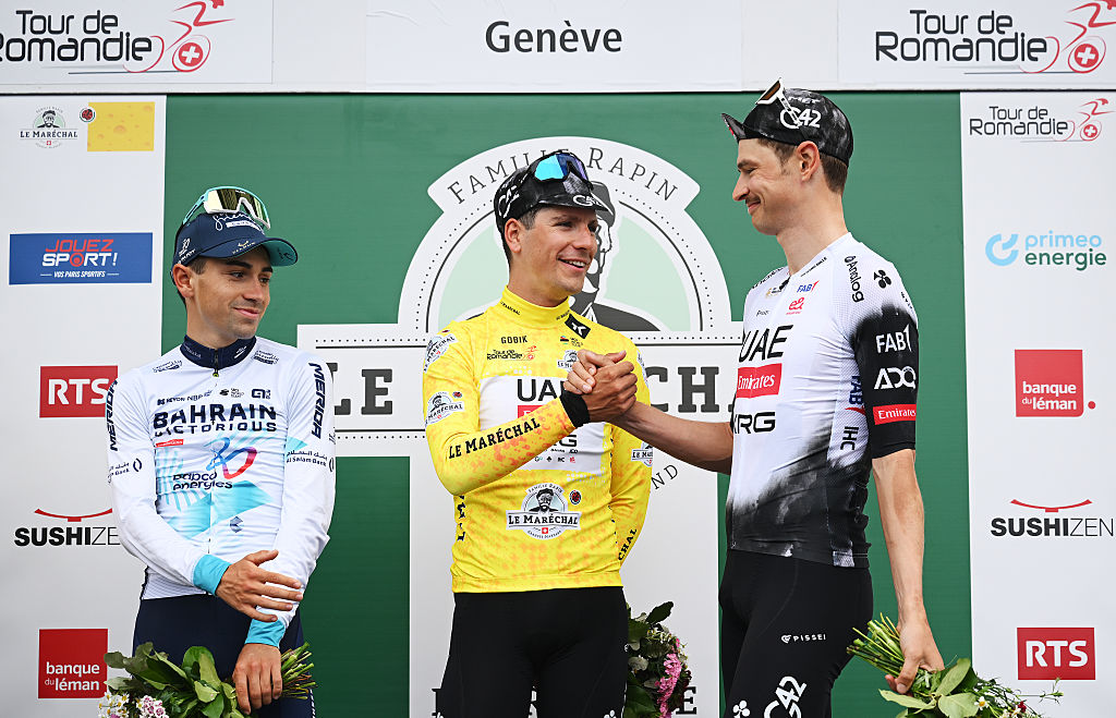 2025 Tour de Romandie GC podium (L to R): runner-up Lenny Martinez of Bahrain Victorious, winner Jo&atilde;o Almeida of UAE Team Emirates-XRG and Jay Vine of UAE Team Emirates-XRG on third place