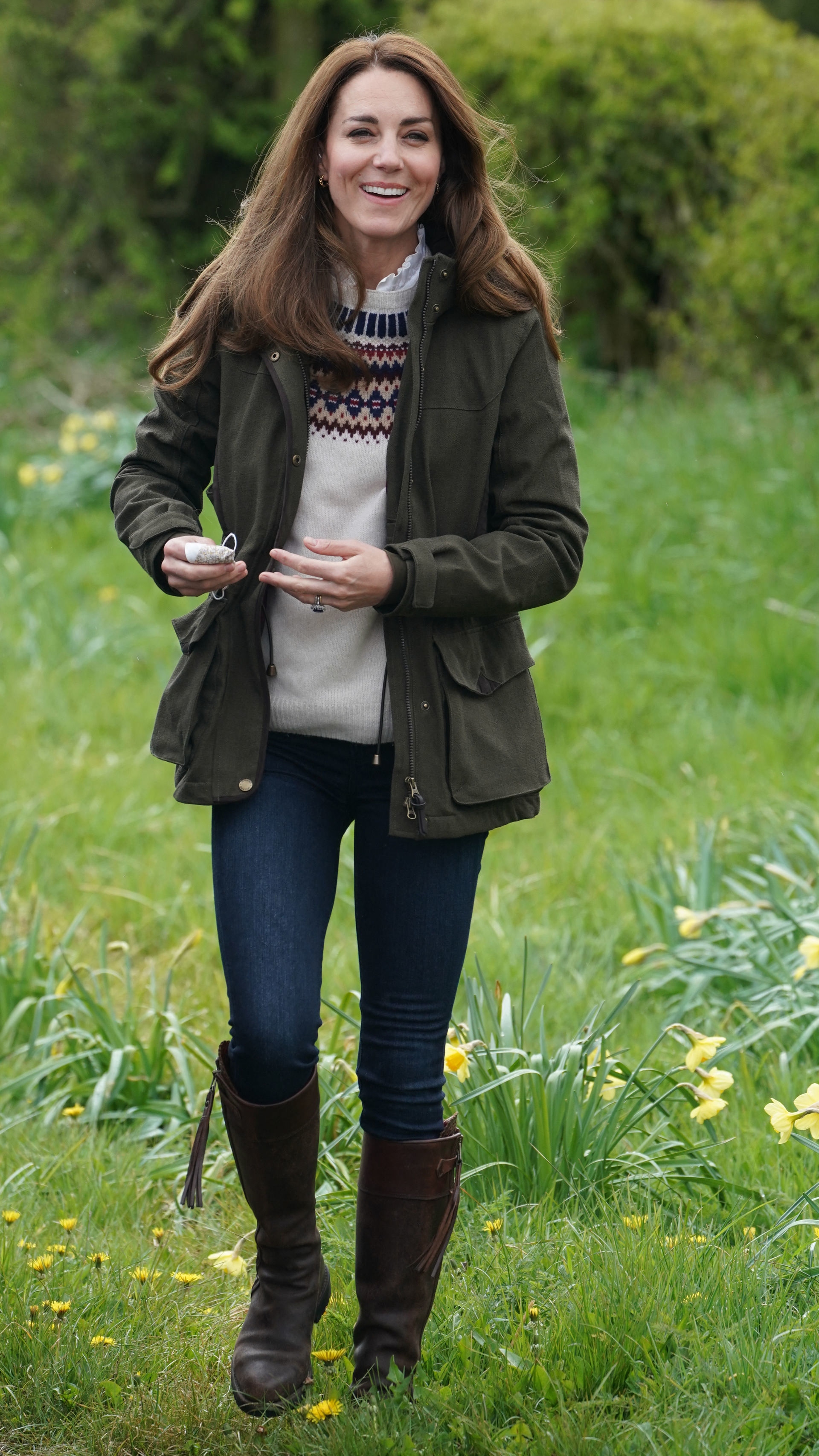 Catherine, Princess of Wales, reacts during a visit to Manor Farm in Little Stainton