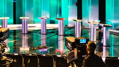 Empty podiums in advance of a televised leadership debate
