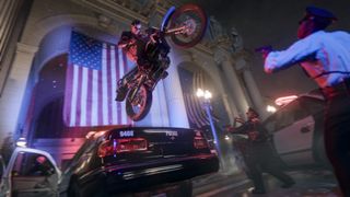 Call of Duty Black Ops 6 promotional screenshot of Adler jumping a dirt bike over a police car with American flags in the background.