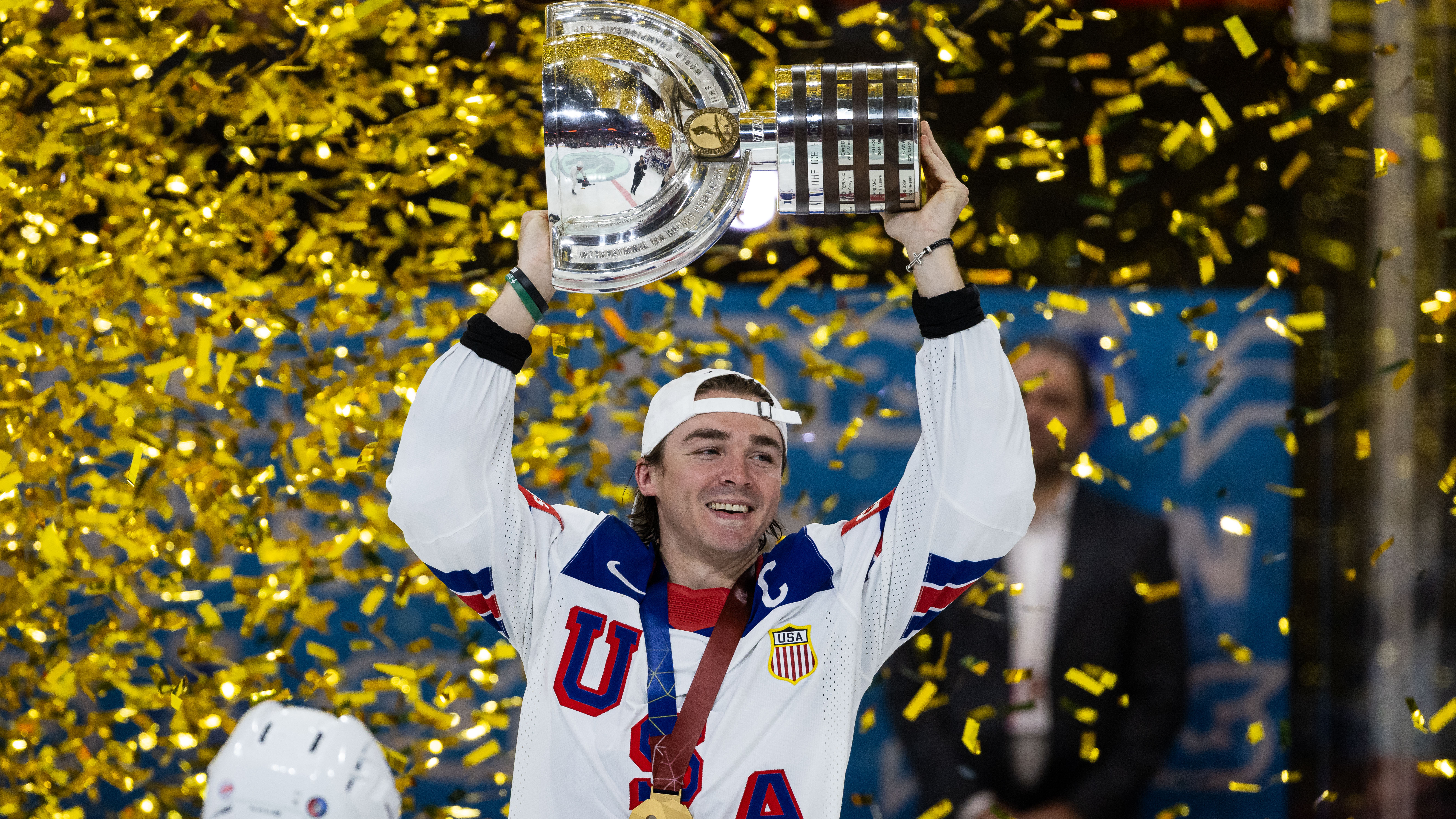 Captain Clayton Keller #9 of team USA lift the IIHF trophy after the 2025 Ice Hockey World Championship match between Switzerland and USA