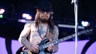 Guitarist Dave Navarro of Jane's Addiction performs onstage with his new band NHC during day 2 of the Ohana Festival Encore weekend on October 02, 2021 in Dana Point, California.