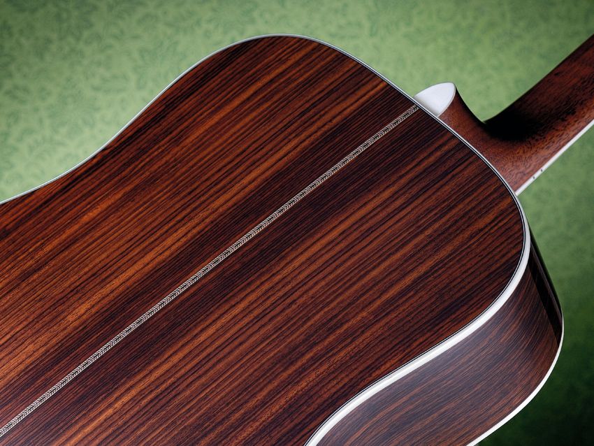 &hellip;while the back and sides are laminated Indian rosewood.