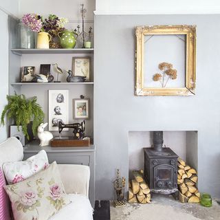 living room with pale blue coloured and fireplace