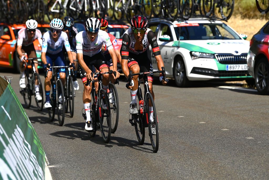 NAVACERRADA SPAIN SEPTEMBER 10 LR Juan Ayuso Pesquera of Spain White Best Young Rider Jersey and Marc Soler Gimenez of Spain and UAE Team Emirates compete during the 77th Tour of Spain 2022 Stage 20 a 181km stage from Moralzarzal to Puerto de Navacerrada 1851m LaVuelta22 WorldTour on September 10 2022 in Puerto de Navacerrada Spain Photo by Tim de WaeleGetty Images