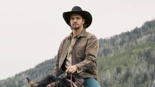 Luke Grimes as Kayce Dutton riding a horse in a promotional photo for 'Marshals'.