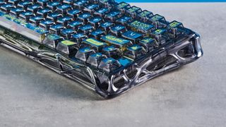 A GravaStar Mercury K1 Lite mechanical keyboard with shine-through keycaps